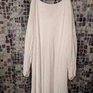 White flowy dress with bell sleeves. Never worn